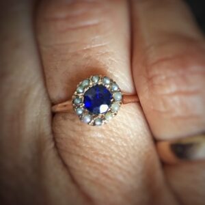 Antique 14kt Rose Gold, Blue Garnet And Seed Pearl Halo Engagement Ring